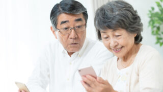 senior couple using a smartphone